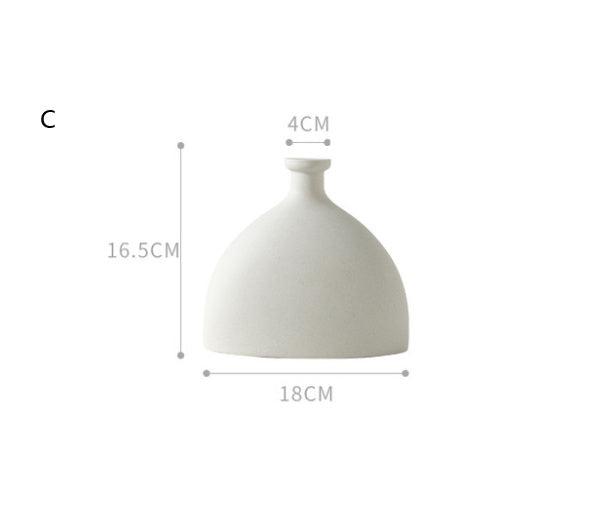 Scandinavian minimalist Nordic decoration ceramic vase with matte glaze on table