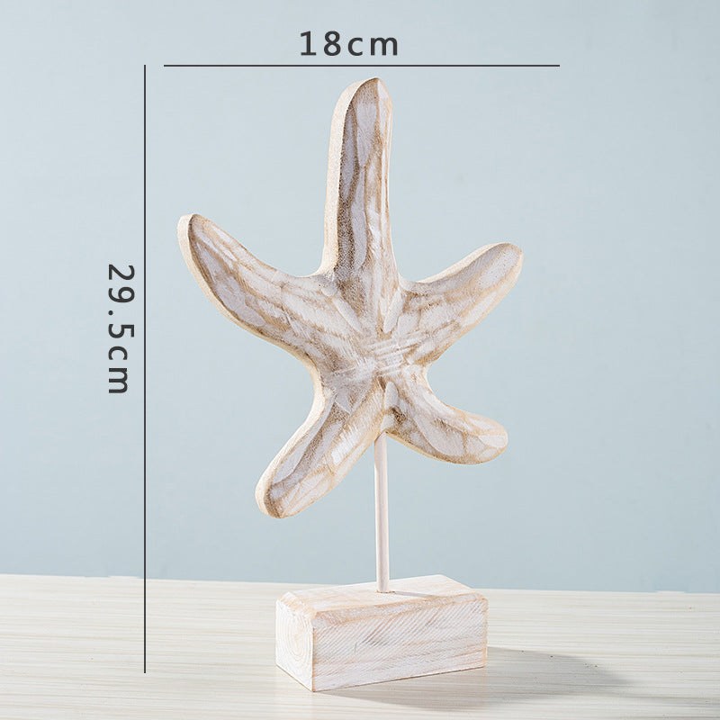 Coastal home decor featuring starfish, seahorse, and conch accents for living room display