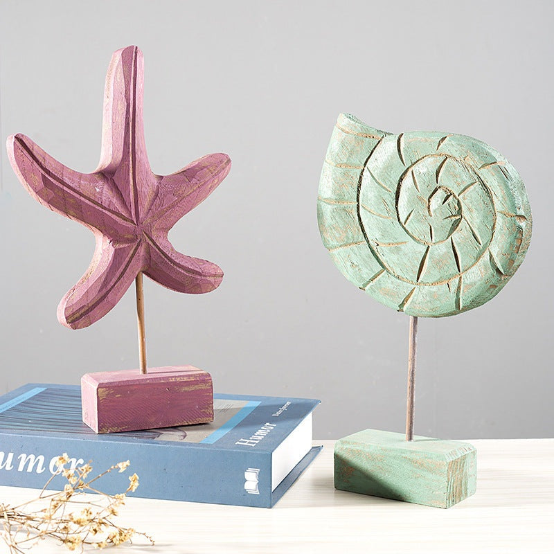 Home decor starfish, seahorse, and conch shells for coastal living room decor