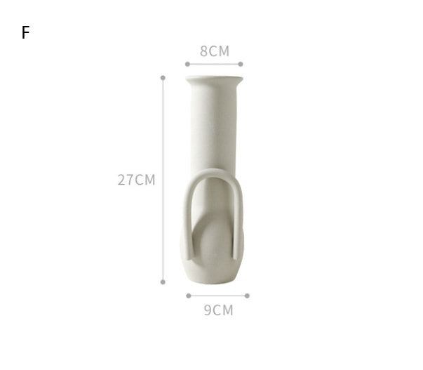 Minimalist Nordic decoration ceramic vase with matte glaze on wooden surface