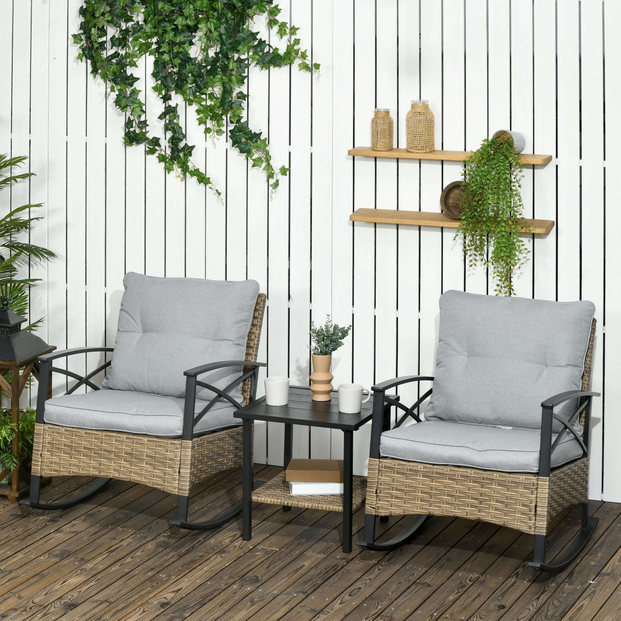 3 Piece Patio Rocking Chair Set with two wicker rocking chairs and a two-tier coffee table in light gray cushions and khaki PE rattan frame