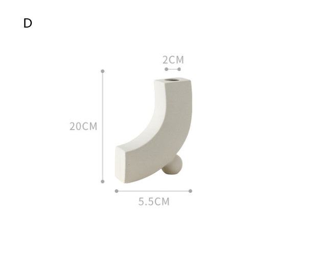 Minimalist Nordic decoration ceramic vase with matte glaze in neutral tones on white background
