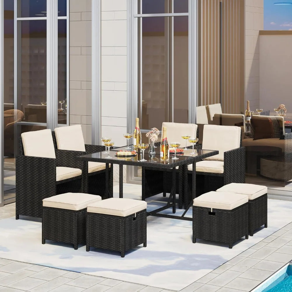 9-piece patio dining set with outdoor rattan chairs and glass table
