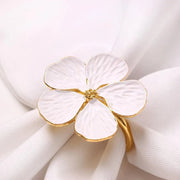 Set of 6 eco-friendly aluminum alloy plum flower napkin rings in white, gold, and silver colors